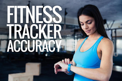 Woman checking a fitness tracker