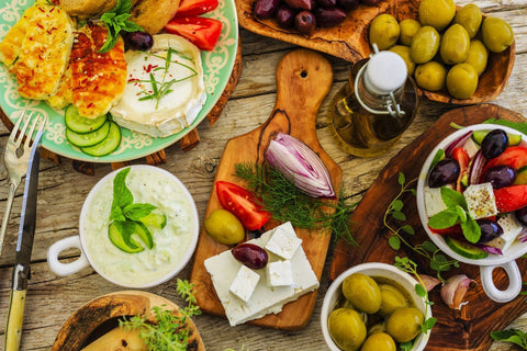Mediterranean dishes with olives, feta and salad