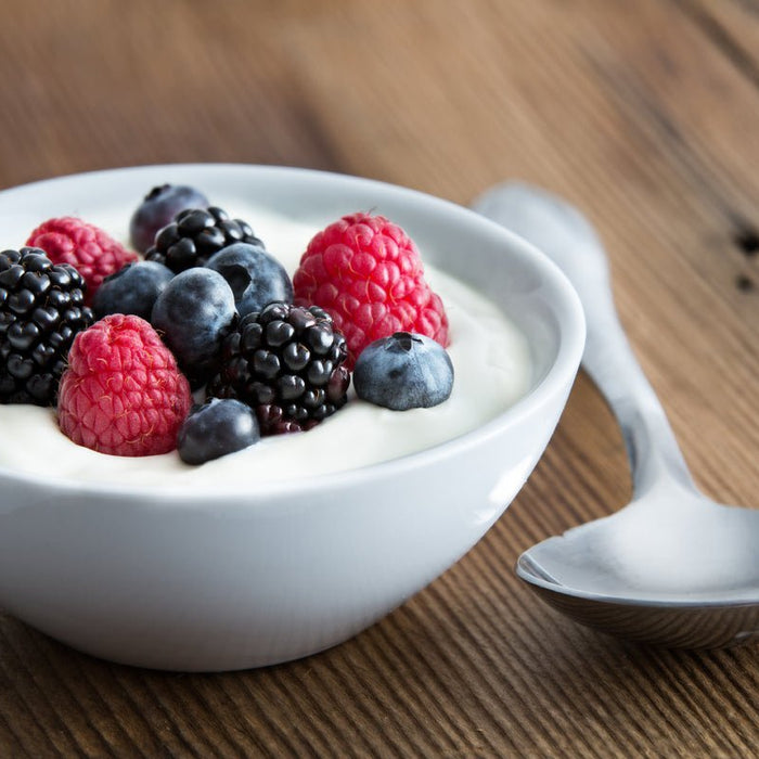 Bowl of yoghurt with mixed berries